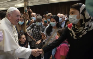 Pope Francis greets people after a documentary screening at the Vatican’s Paul VI Hall, Sept. 6, 2021. Vatican Media.